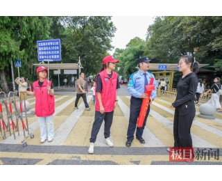 跨越8米深夹缝的“双向奔赴”：东湖义警100分钟“钓”回游客手机，广州女士连夜定制锦旗表谢意